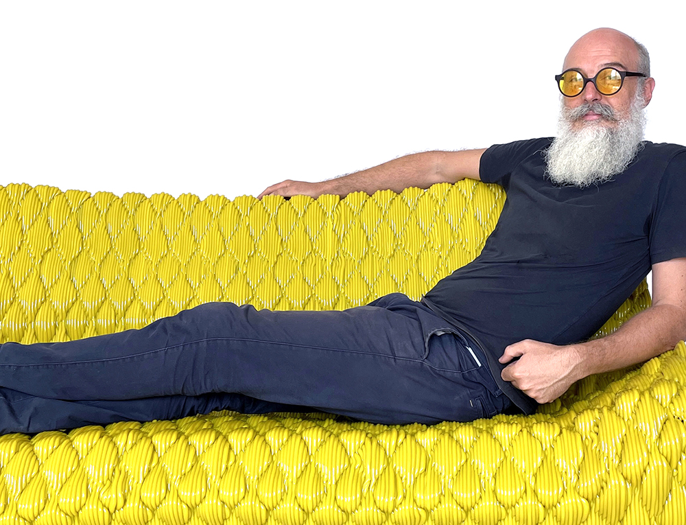 Guillaume Credoz sitting on the Abnormal Couch